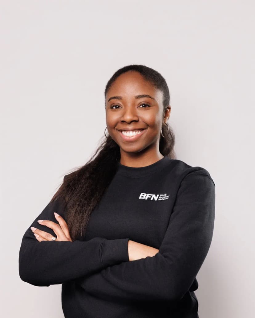 Second team member from the same session — identical lighting and backdrop