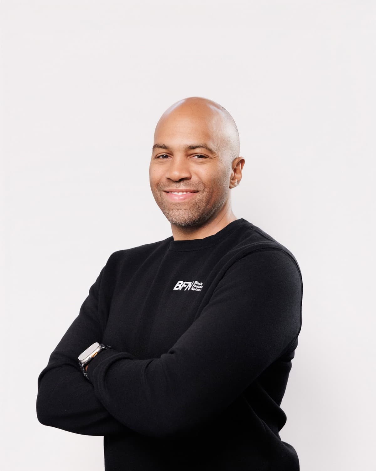 Team member headshot with consistent single-session studio lighting