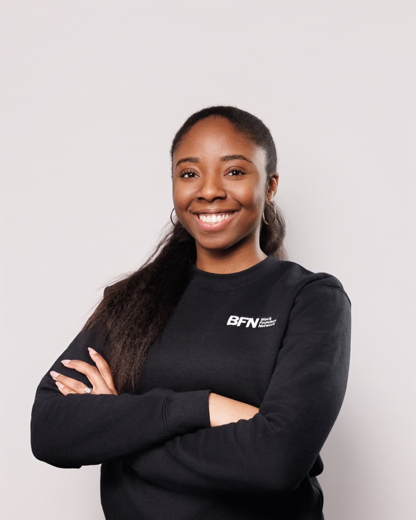 Second team member from the same session — identical lighting and backdrop